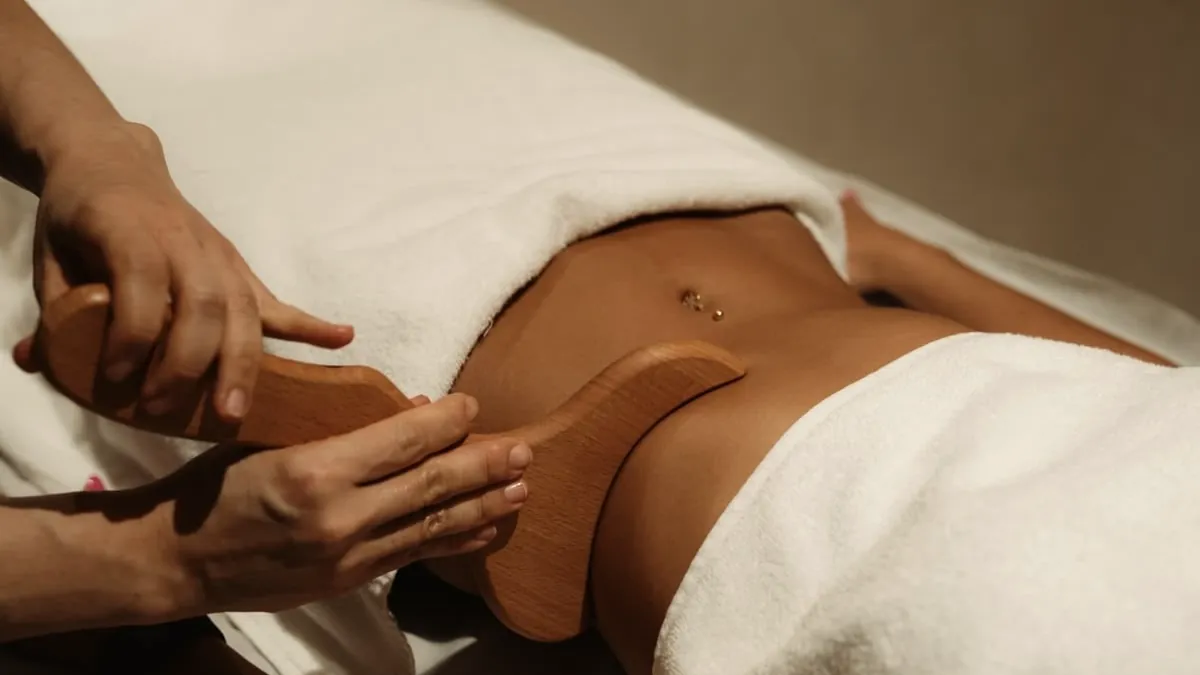 A body sculpting session on a client's abdomen at Millán Spa, Miami Beach